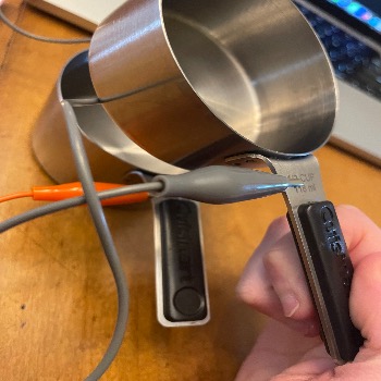 I made an iteration where when a user puts the measuring cups together, the circuit completes. 