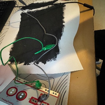 This is an image of how I had the conductive paint set up with the makey makey.